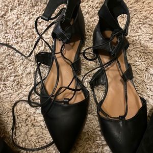 Black flats with tie up. Very cute and sexy look on legs. Size 10!